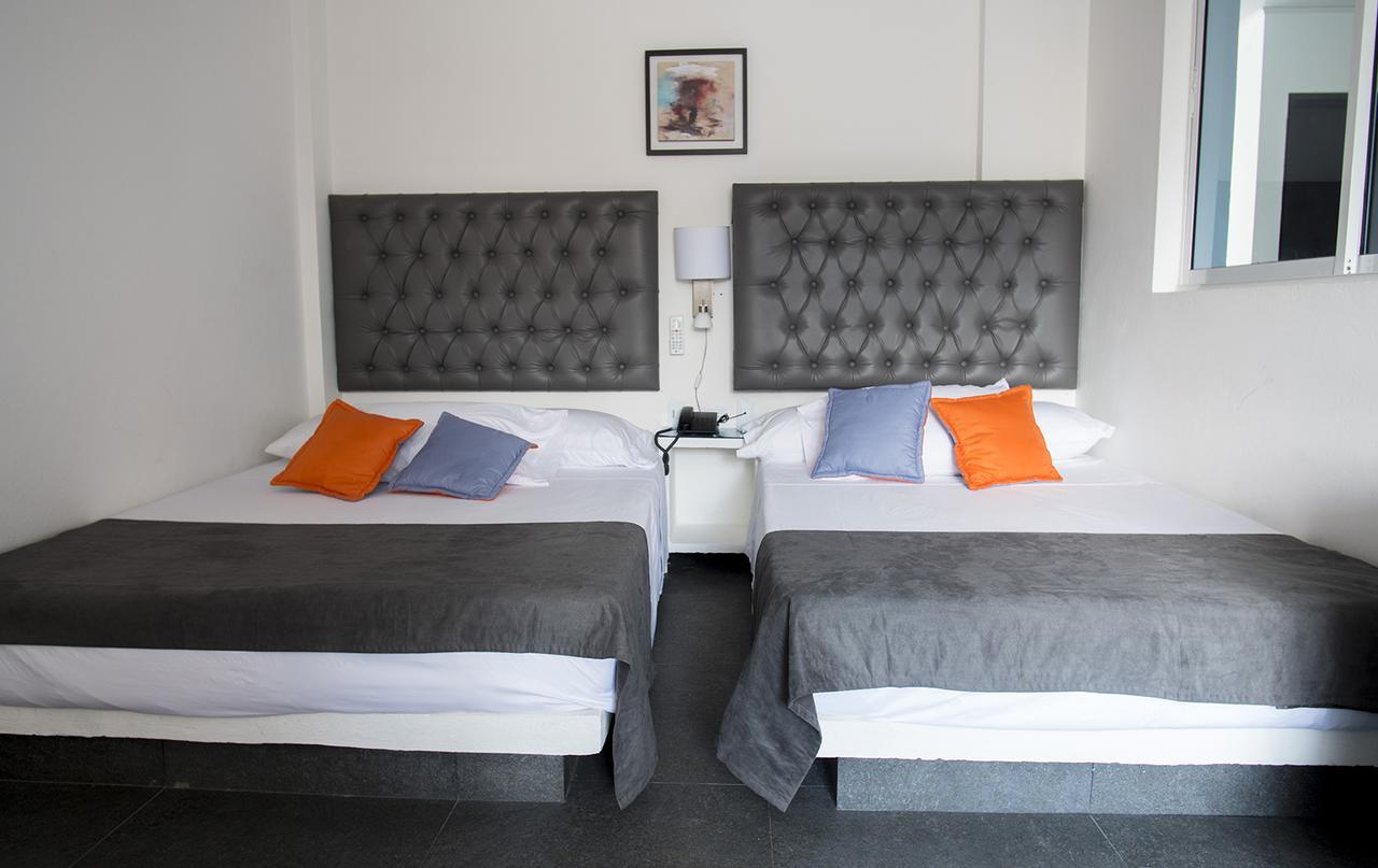 Hotel Grand H&R Villeta Extérieur photo