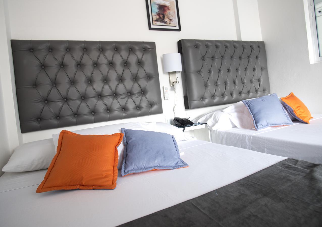 Hotel Grand H&R Villeta Extérieur photo